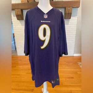 Justin Tucker Purple Ravens Jersey, Number 9, extra large NFL football on field